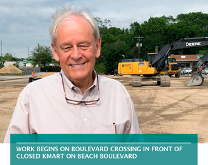 Work begins on Boulevard Crossing in front of closed Kmart on Beach Boulevard