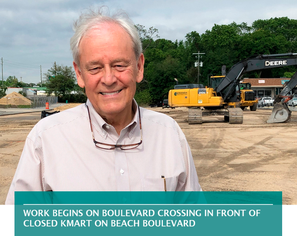 Work begins on Boulevard Crossing in front of closed Kmart on Beach Boulevard
